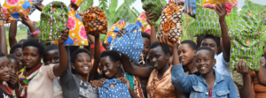 Photo of young women with Days for Girls kits. Image used courtesy of Days for Girls.