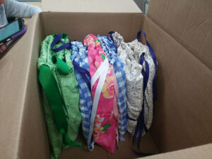Days for Girls kit bags completed and packed into a box for shipment.