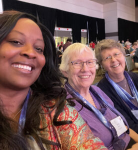 Hermine Ngomire, Marty Allison, and Mary Ann Watson at UWF Assembly 2022