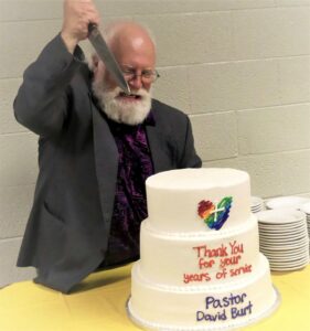 A photo of Pastor David and his farewell cake