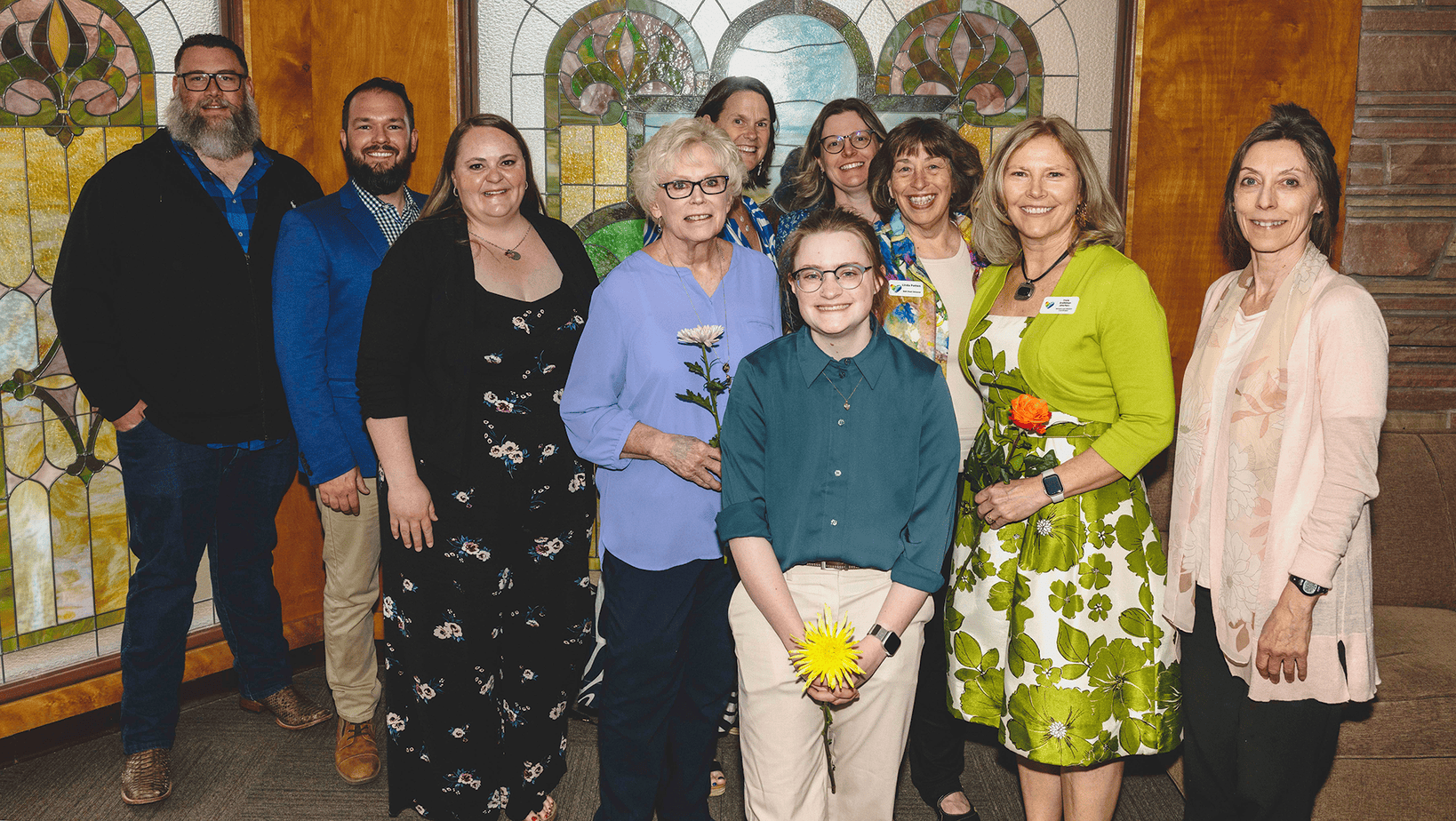 HOL staff standing in front of the church doors at Easter